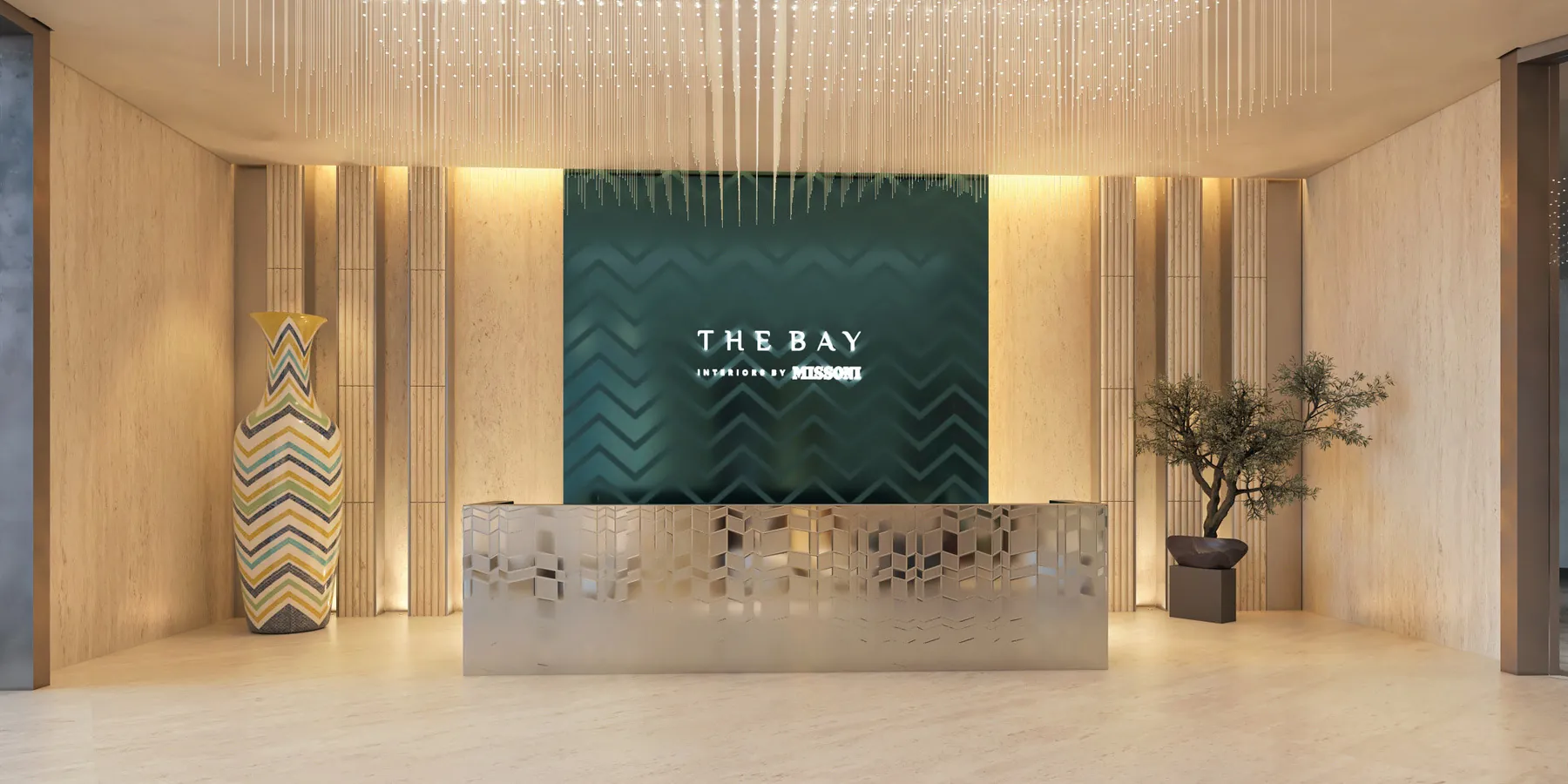 Lobby of The Bay Interiors by Missoni on Dubai Islands, with a reception desk, a chevron wall, and a patterned vase